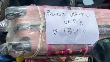 Kreativitas Pemudik Motor 2026: Pesan Unik di Punggung Jadi Penghalau Penat di Jalan Raya