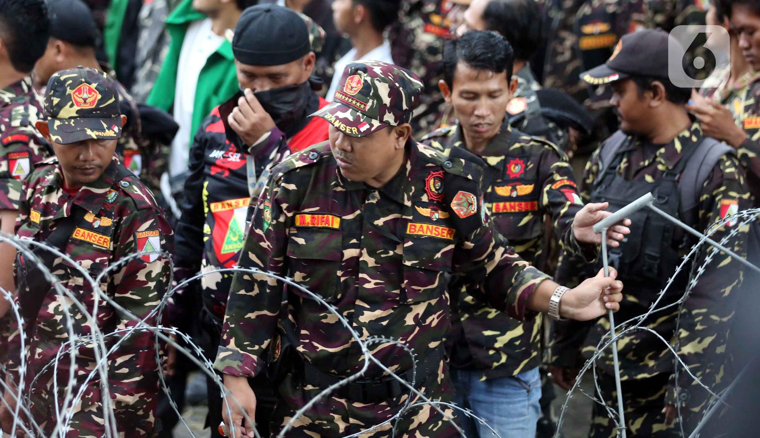 Gelombang Solidaritas di KPK: Banser Unjuk Rasa Usai Penahanan Yaqut Cholil Qoumas dalam Kasus Kuota Haji
